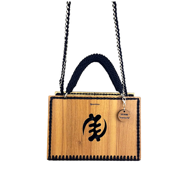 Daafua large-wood carved plate crochet handbag